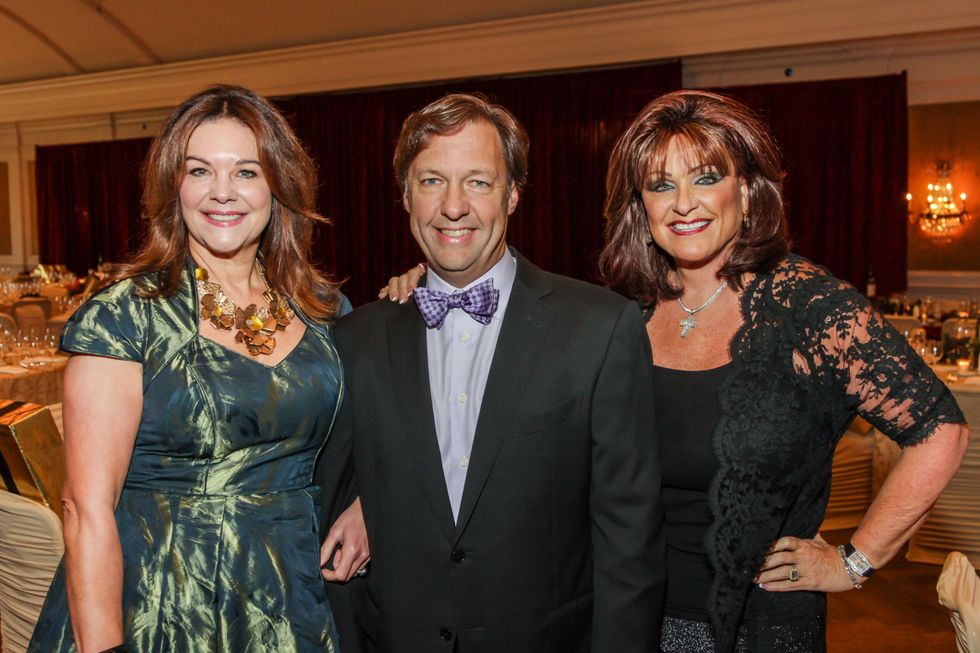 Kim and Richard Rolland, from left, with Carolyn Faulk at Best Cellars September 2014