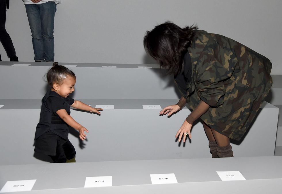 Kim Kardashian and North West at the adidas Originals x Kanye West YEEZY SEASON 1 fashion show