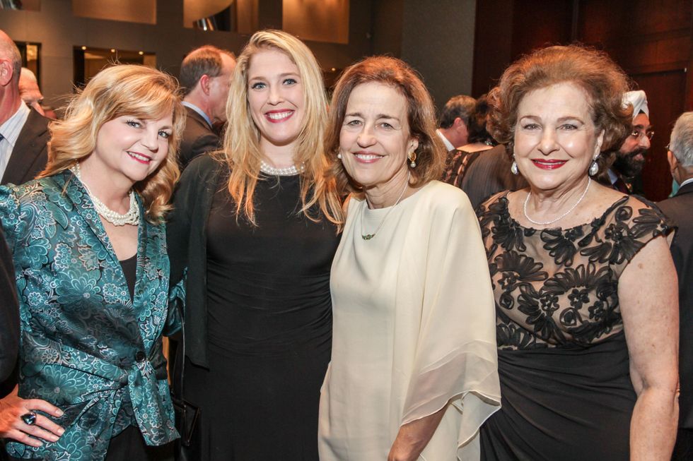 Kim Padgett, from left, Jennifer Roosth, Andrea White and Joann Crassas at the Interfaith Ministries Tapestry Gala May 2014