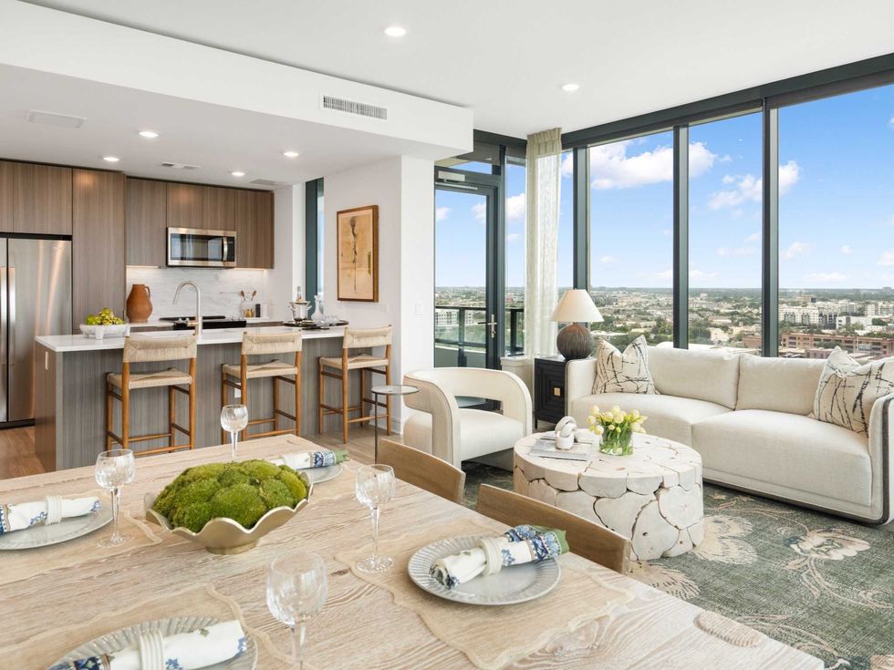 Kitchen, living and dining area of a two-bedroom unit at Hanover Buffalo Bayou