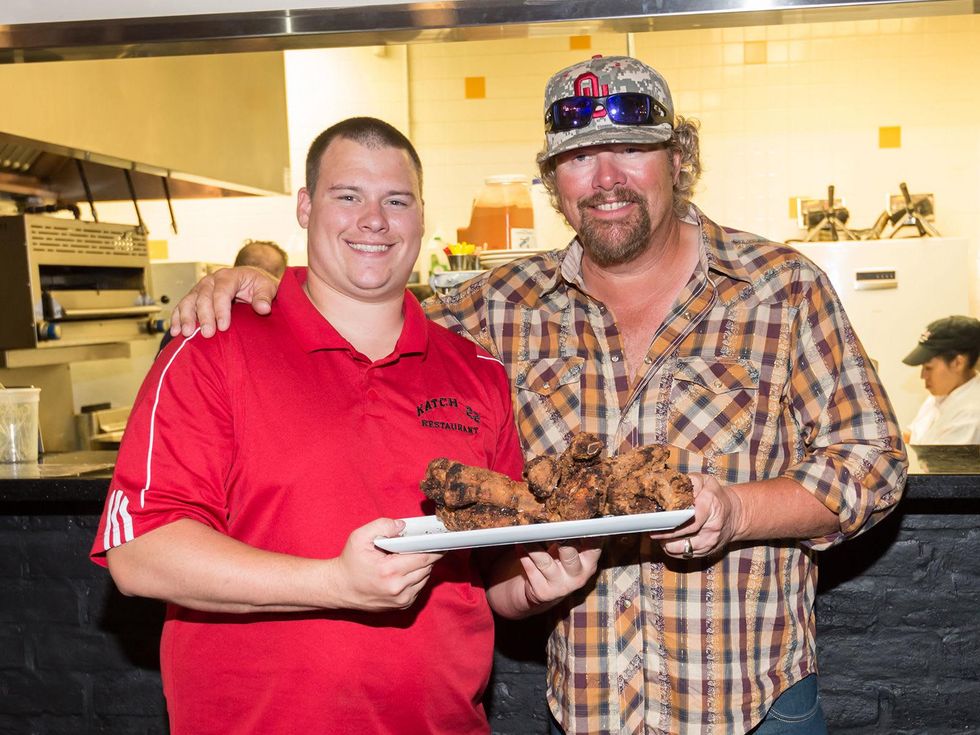 Kory Clemens, left, and Toby Keith at Roger Clemens' Celebrity Slam Party July 2014