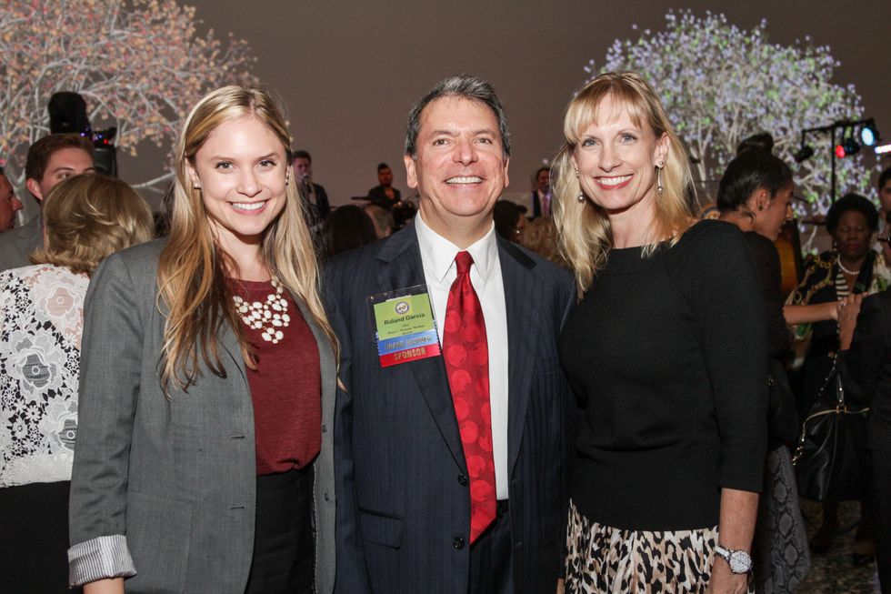 Kristin Garcia Blomquist, from left, with Roland and Karen Garcia at the Mayor's Hispanic Heritage Awards event October 2014