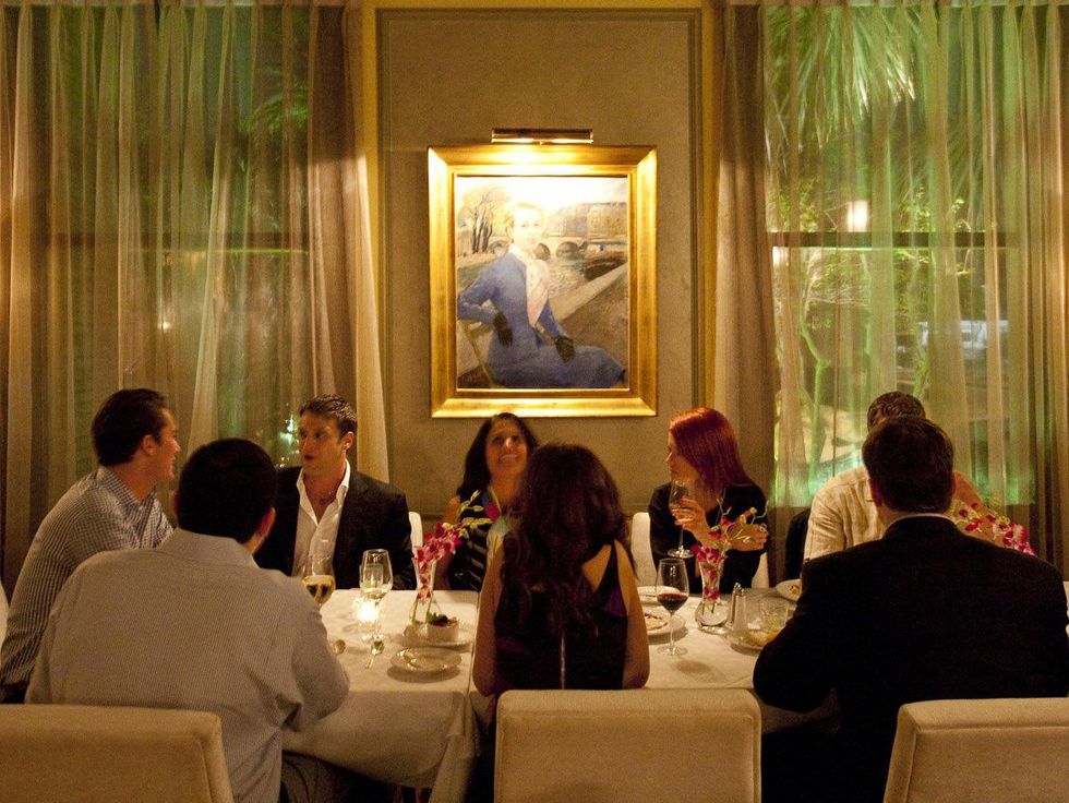 La Colombe d'Or Hotel and Restaurant, Restaurant Cinq, people dining, January 2013