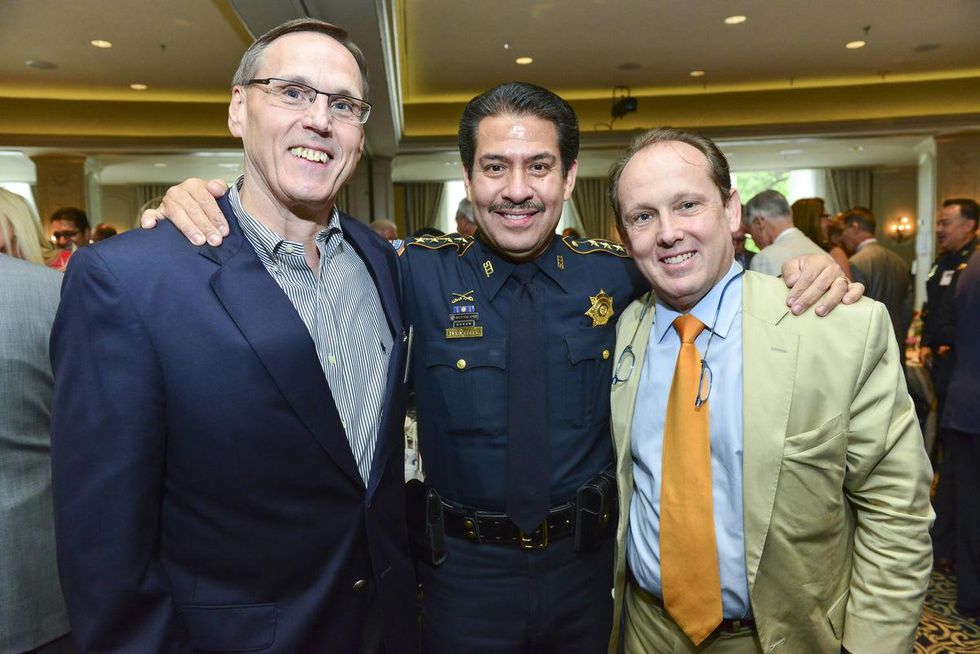 Larry Blackburn, from left, Adrian Garcia and Franco Valobra at the Crime Stoppers luncheon May 2014