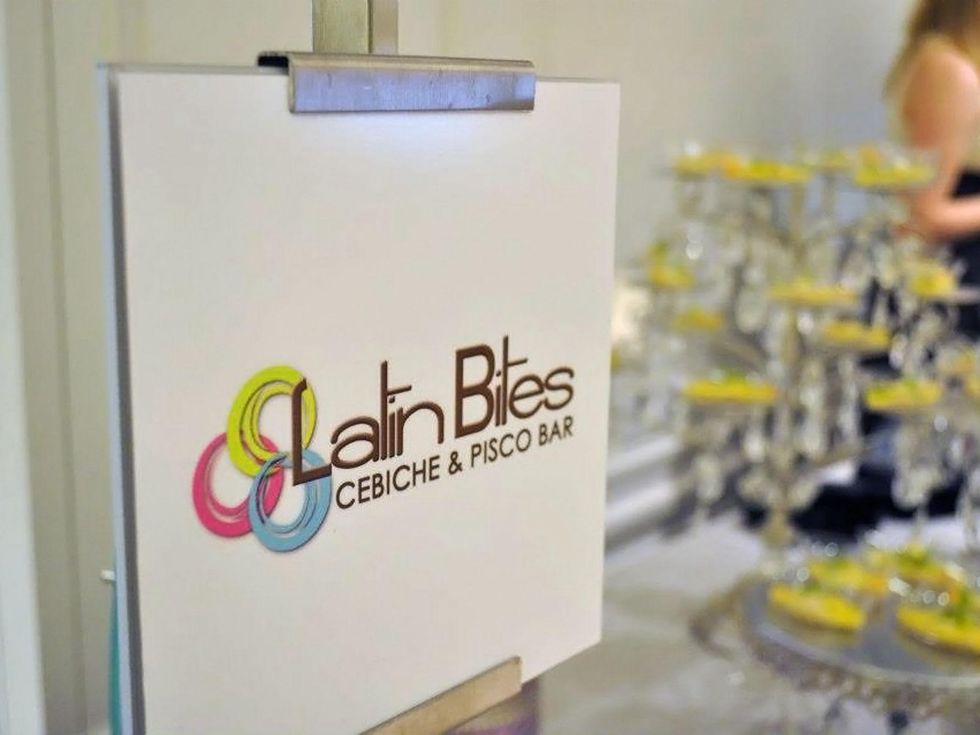 Latin Bites Houston sign on open door