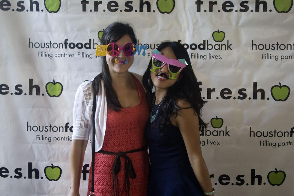 Laura Novia, left, and Chloe Kwon at the f.r.e.s.h. new young professionals group party june 2014
