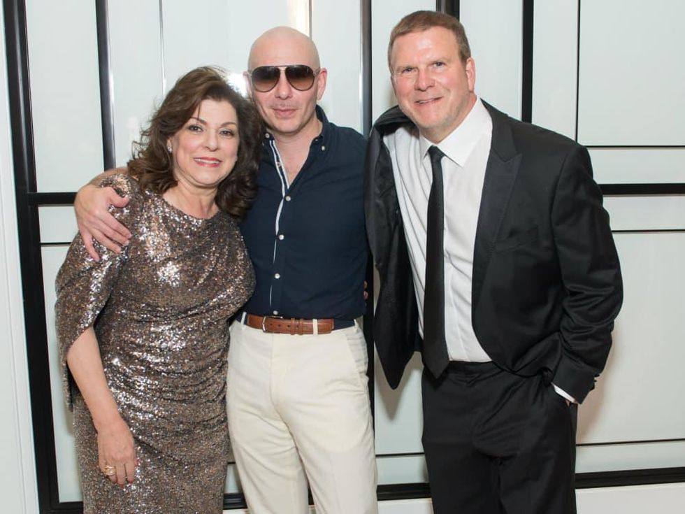 Laura Ward, Pitbull, and Tilman Fertitta