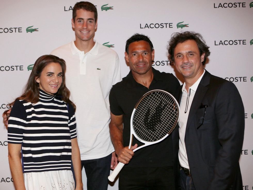 Laure Heriard Dubreuil, John Isner and others at The Webster Lacoste party