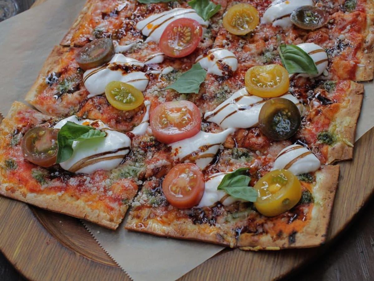 Burrata and heirloom tomato crisp. CultureMap Houston