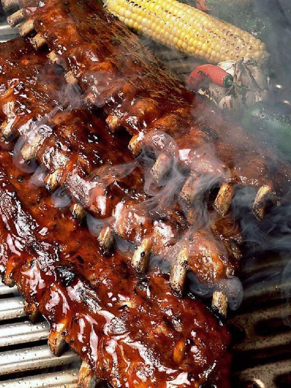 Leon's World's Finest baby back ribs on grill