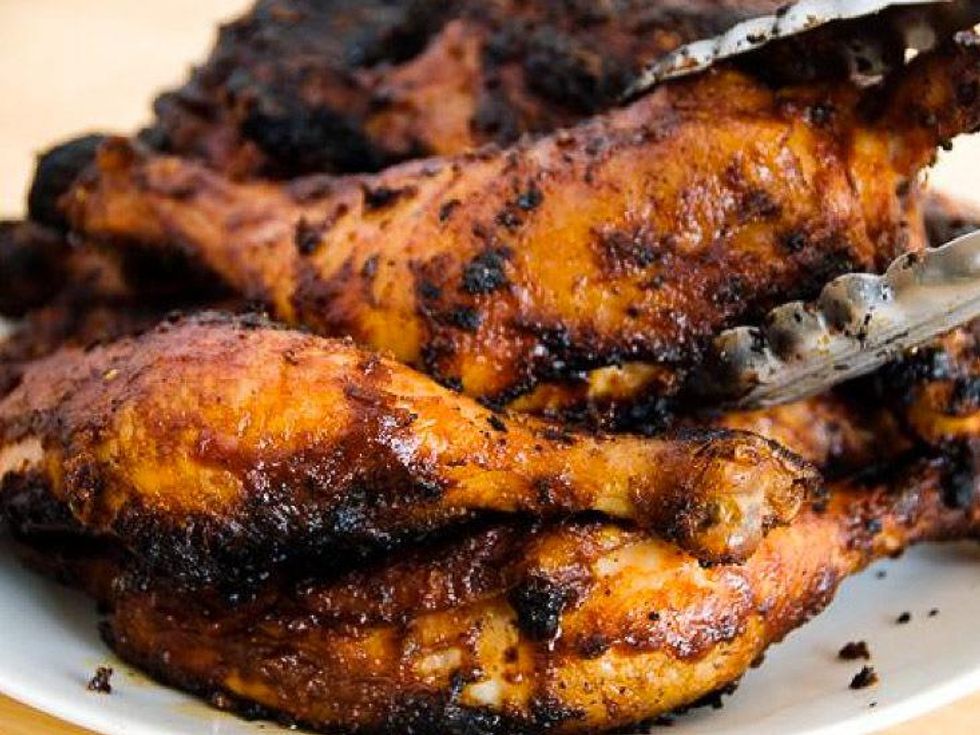 Leon\u2019s World\u2019s Finest In & Out Barbecue in Galveston barbecue chicken and tongs