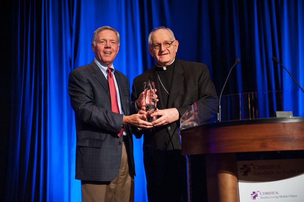 Les Cave, left, and Joseph Fiorenza at the CHRISTUS Foundation for HealthCare spring luncheon April 2015