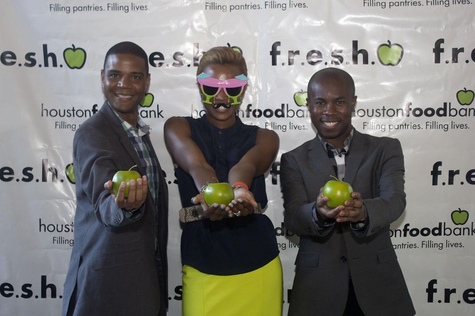 Leslie Jackson from left, Shavonnah Roberts Schreiber, and Chris West at the f.r.e.s.h. new young professionals group party june 2014.