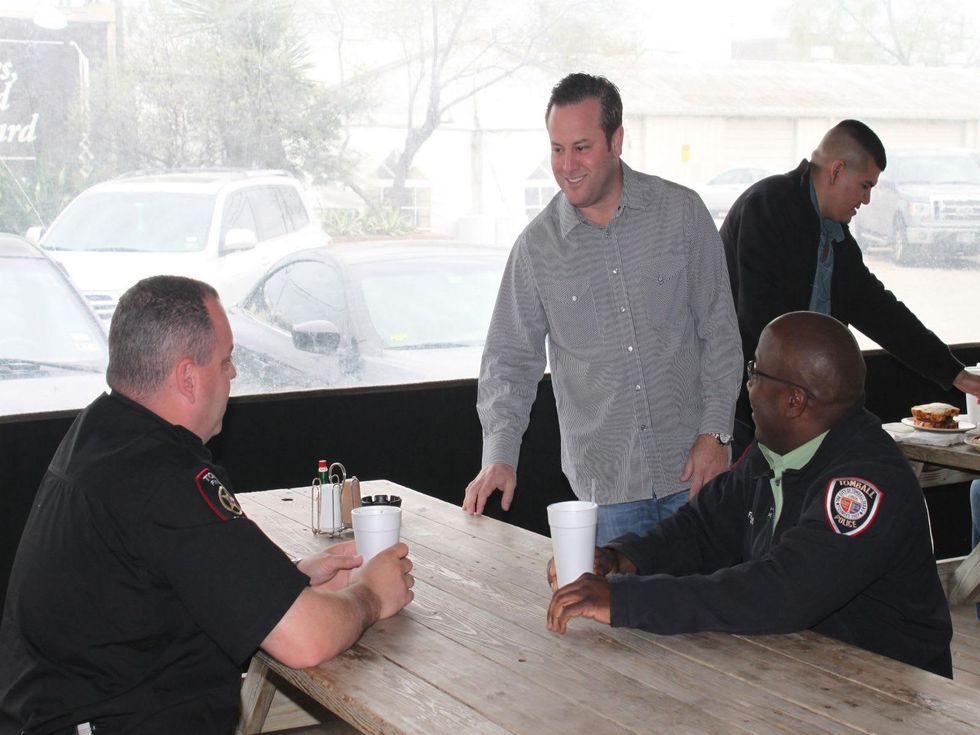 Levi Goode with Houston firefighters