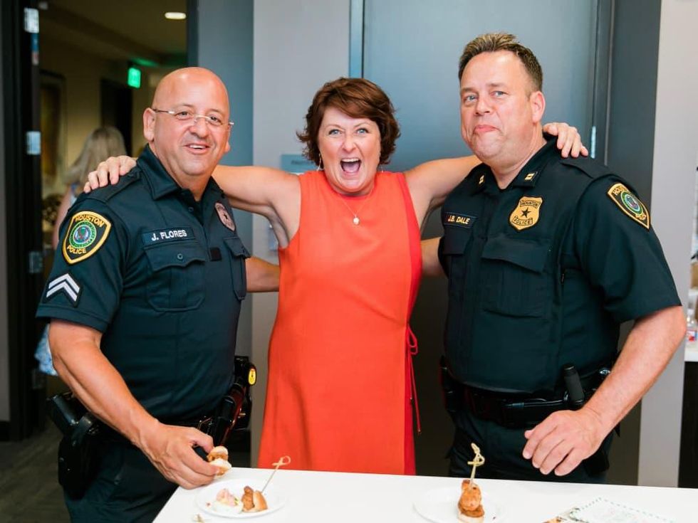 Lezlie Mahan and security officers at CultureMap Country Club Social