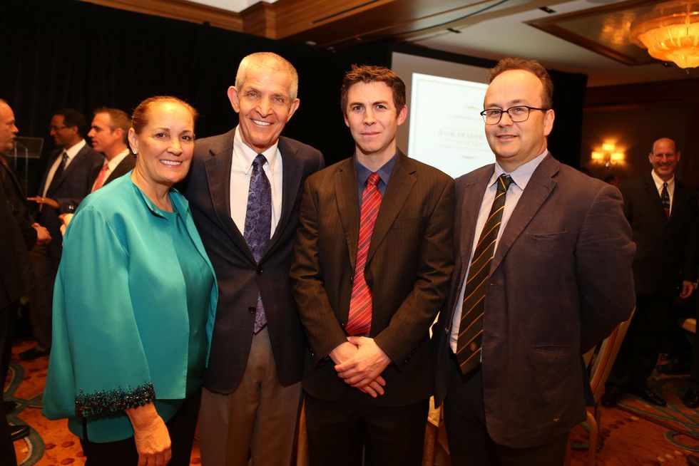 Linda and Jim McIngvale, from left, Daniel Timms and John F. Fraser at the Bud Frazier event May 2014