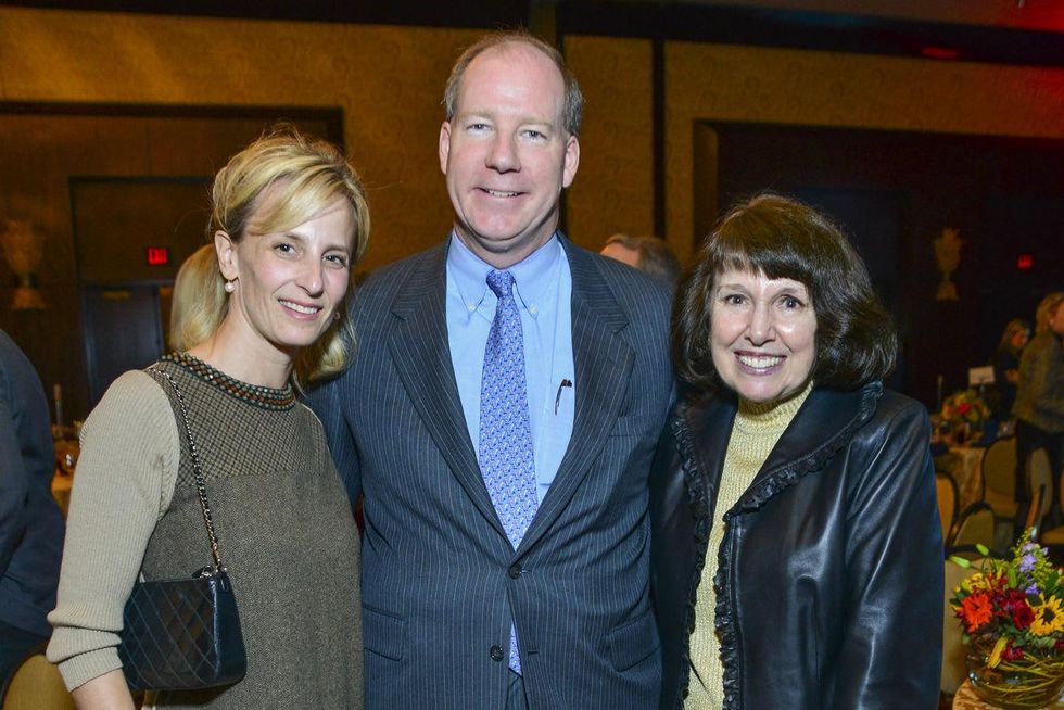 Linda Gill, from left, with David and Christine Underwood at the National Philanthropy Day luncheon November 2013