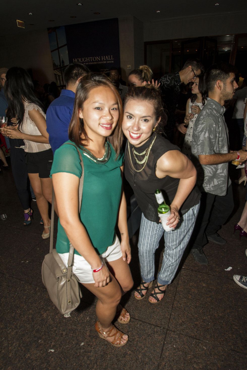 Linda Ha, left, and Julieta Delua at the MFAH Mixed Media Party June 2014