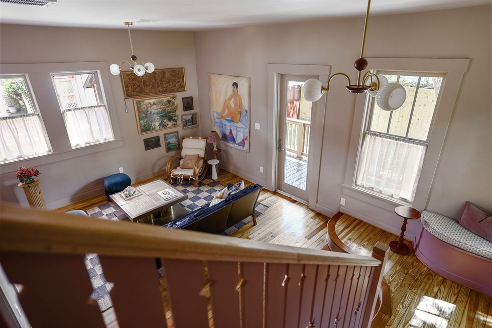 Living and gathering space of 814 Omar as seem from the staircase