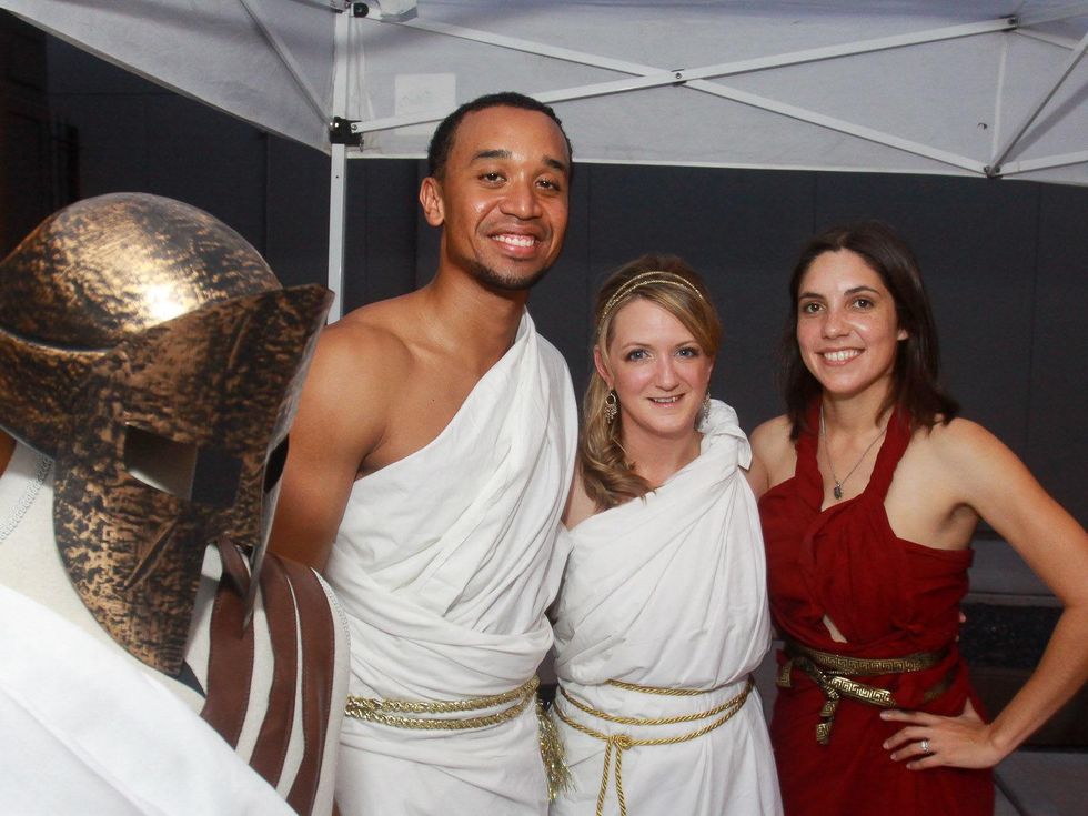 Livio Ituah, from left, Samantha Darr-Rankin and Alex Silva at toga party at Craft Salon benefiting Bering Omega