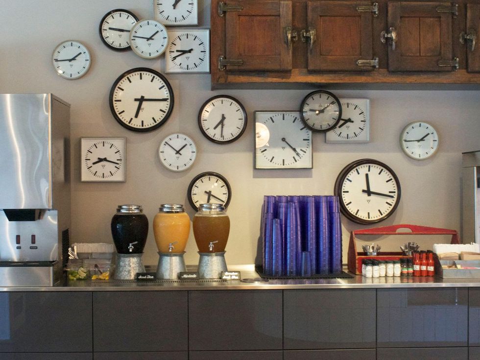 Local Foods Houston March 2014 clocks on wall