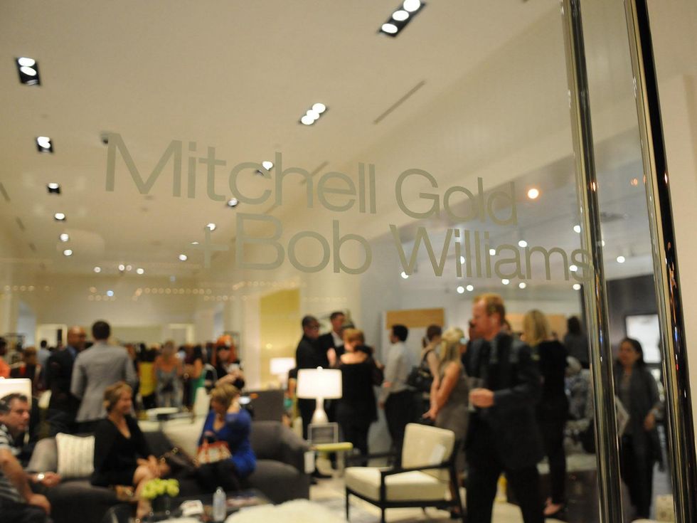 look through door at the Mitchell Gold + Bob Williams Houston grand opening celebration
