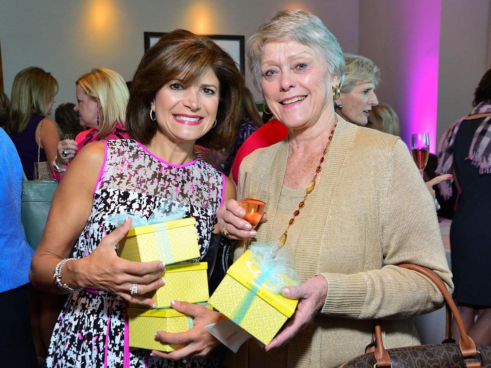 Lori Wolterman, left, and Bobetta Lindig at the Memorial Hermann Razzle Dazzle Pink Luncheon October 2013