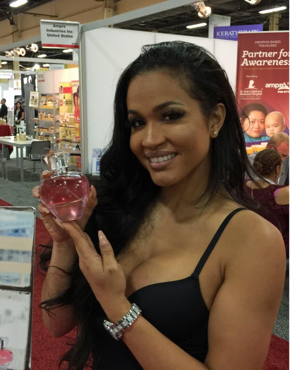 Love & Hip Hop Hollywood reality star Rosa Acosta is passing out samples of her perfume, Rosa, at Cosmoprof 2017