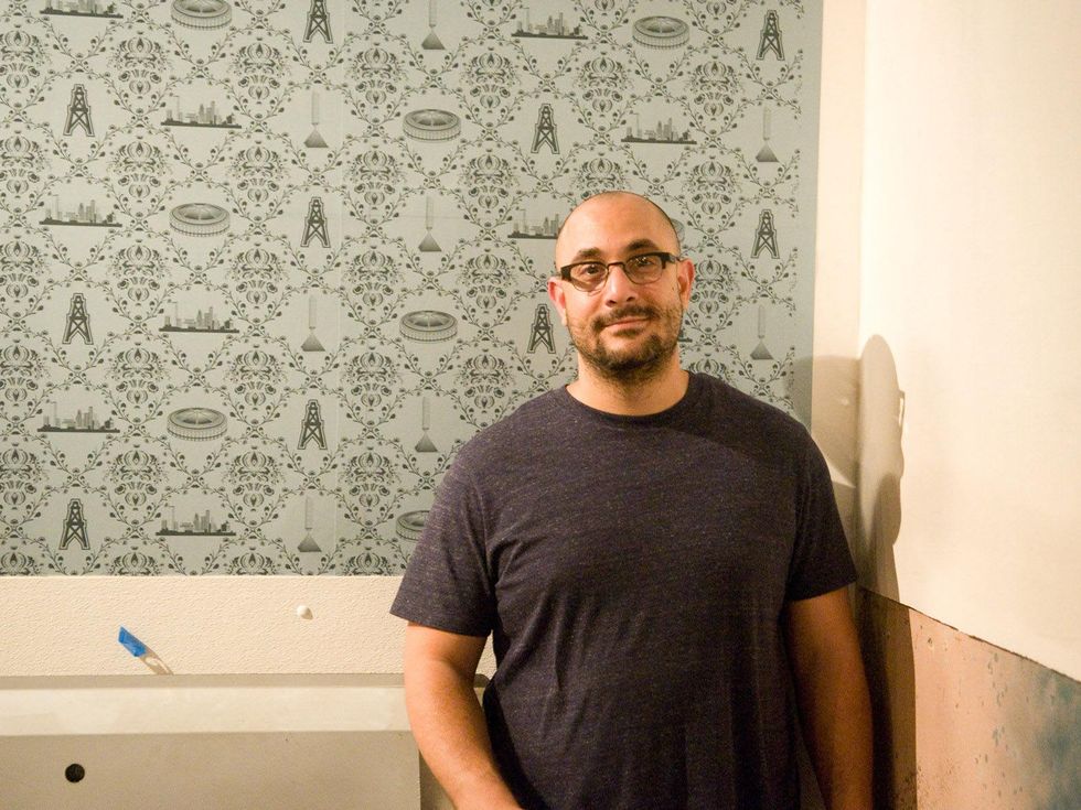 Low Brow bar under construction October 2013 WITH GUY