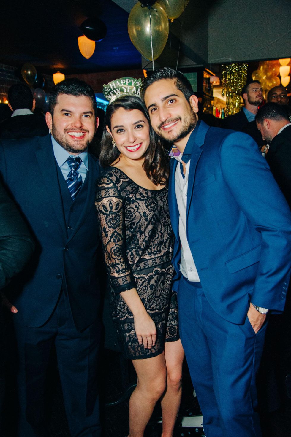 Luis Larios, left, with Shatha and Ramzy Kasem at New Year's Eve at Local Pour January 2015
