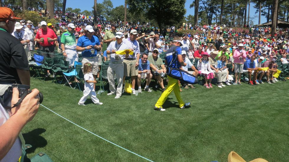 Luke Donald at Masters golf tournament with 3-year-old daughter