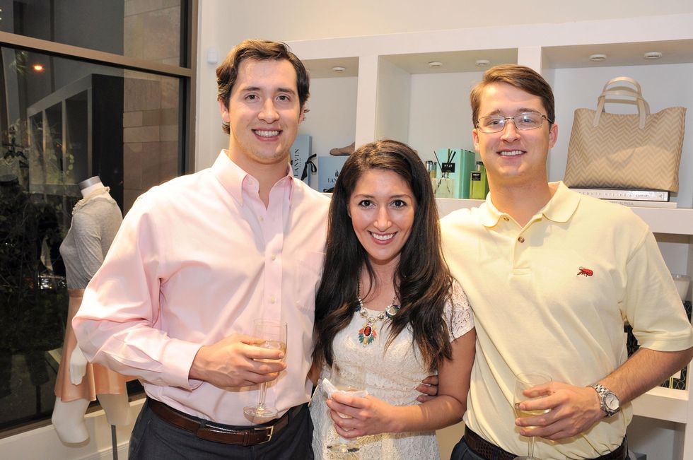Luke Fertitta, from left, Natasha Helm and Jonas Fertitta at the What We Wear Where Mobile App party December 2013