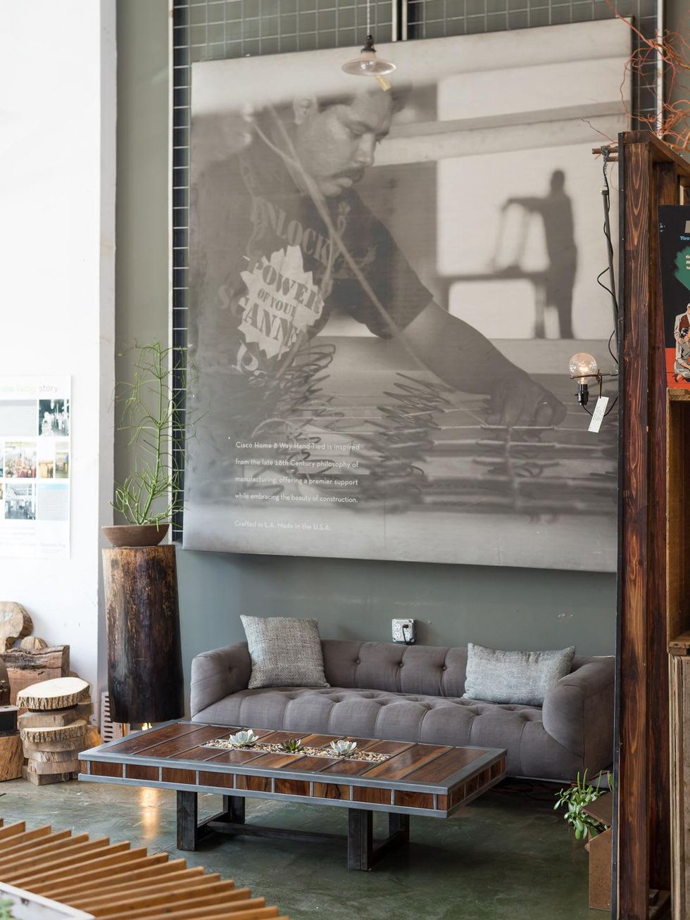 Made at New Living an organic nontoxic couch from Cisco Brothers and New Living\u2019s newest handmade artisan coffee table made from reclaimed wood and includes succulents July 2014