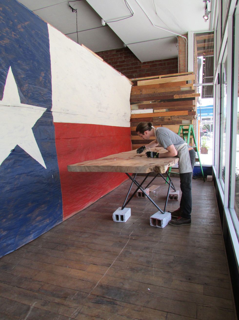 Made at New Living Wyatt Little artisan working on table June 2014