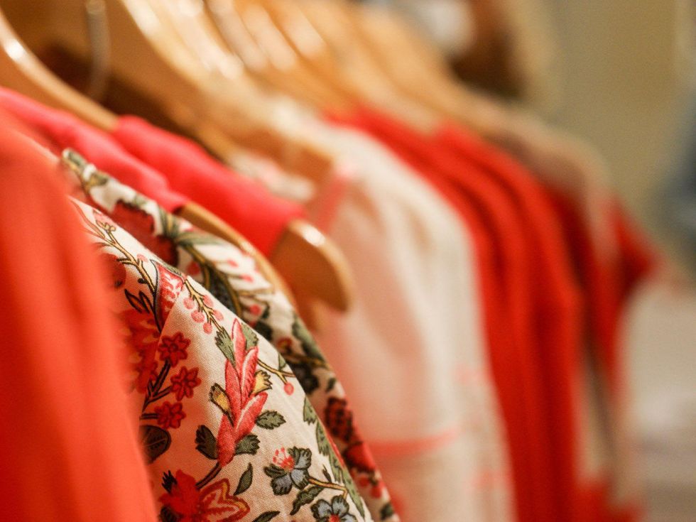 Madewell Houston June 2013 row of hanging clothes blurred