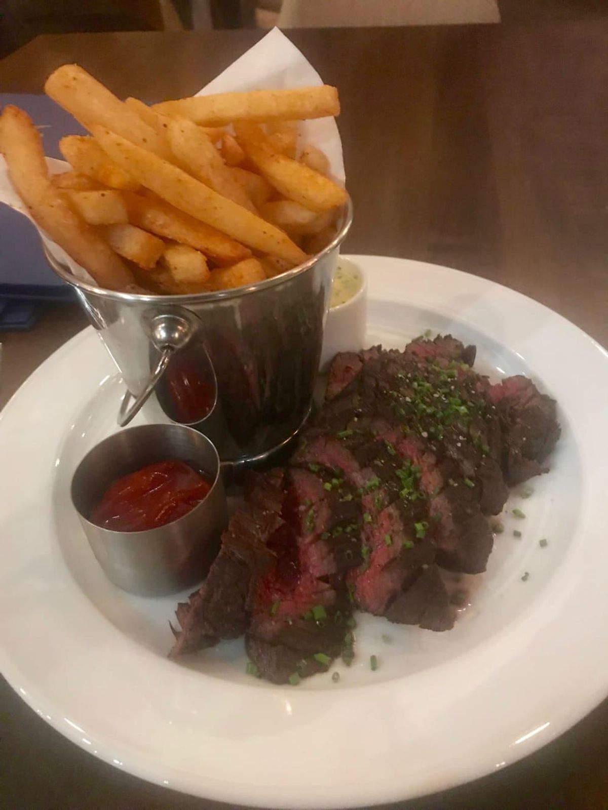 Steak frites uses a hanger steak from Heartbrand beef. CultureMap Houston