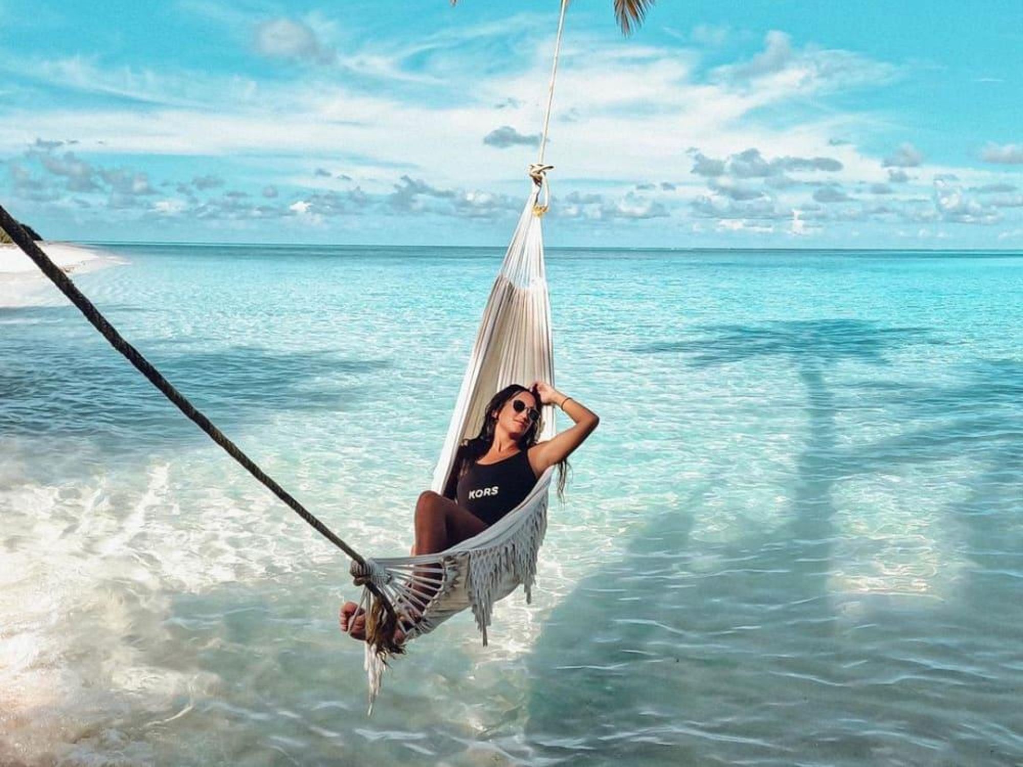 Maldives tree hammock island water
