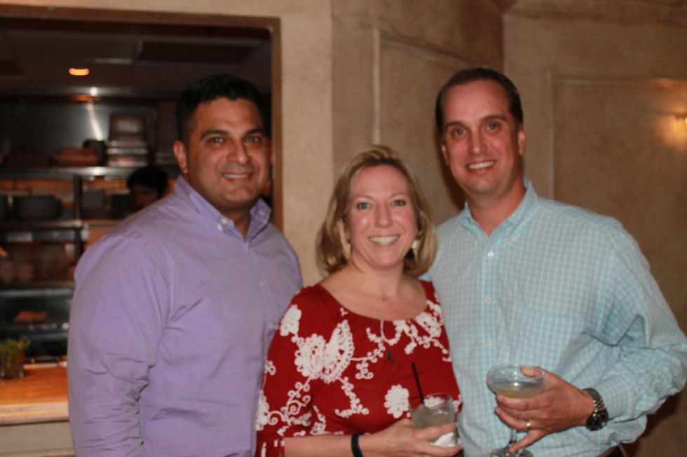 Manny Bonnila, from left, Zilah Miller and Jeff Driskell at the Friends of St. Jude Spring Happy Hour March 2015