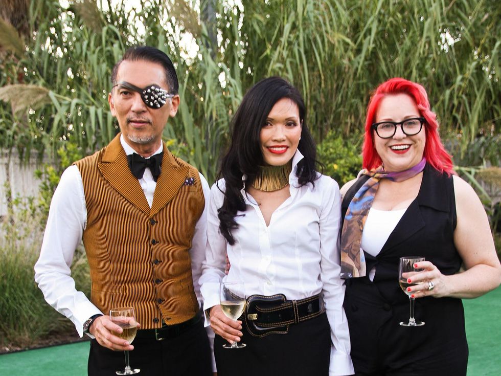 Marc Huynh, from left, Duyen Huynh and Thedra Cullar-Ledford at the Bill Viola Aurora Picture Show Award party October 2013