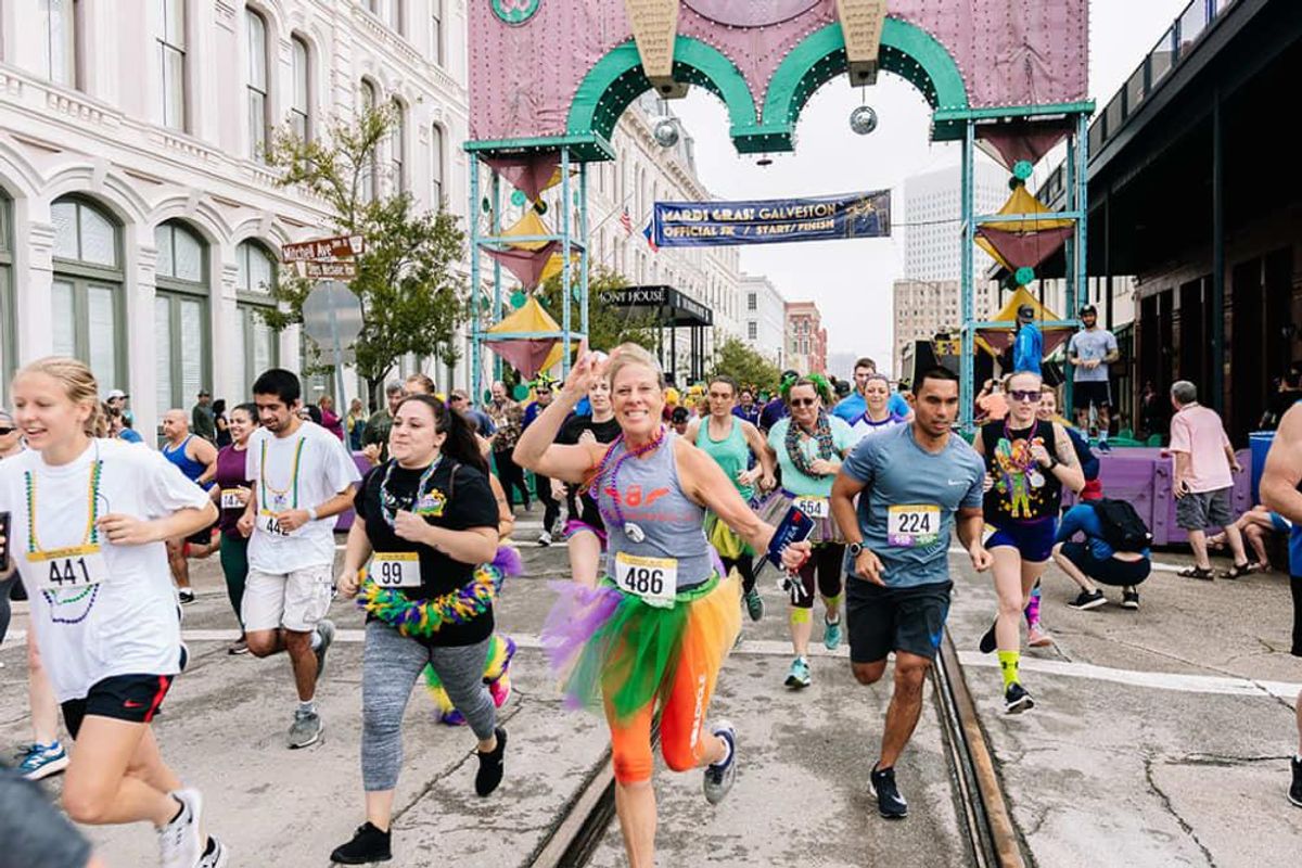 Run off the calories at the Mardi Gras 5K Run. CultureMap Houston