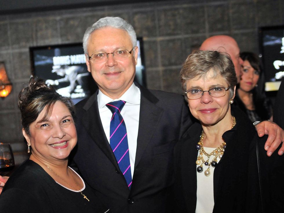 Margie Reyes, from left, with David and Blanca Medina at the Mayor's Hispanic Advisory Board Holiday Party December 2013