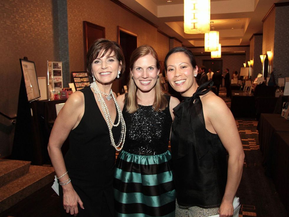 Maria Elena Herbst, from left, Nancy Kate Prescott and Ting Bresnahan at West University Park Lovers Ball February 2014