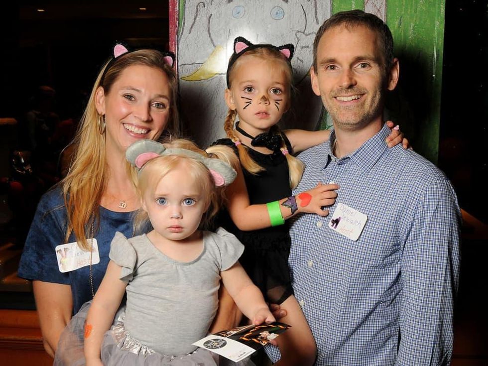 MD Anderson Halloween at the Galleria Cricket and Daniel DeWalch with Sophie, 3, and Lauren, 2