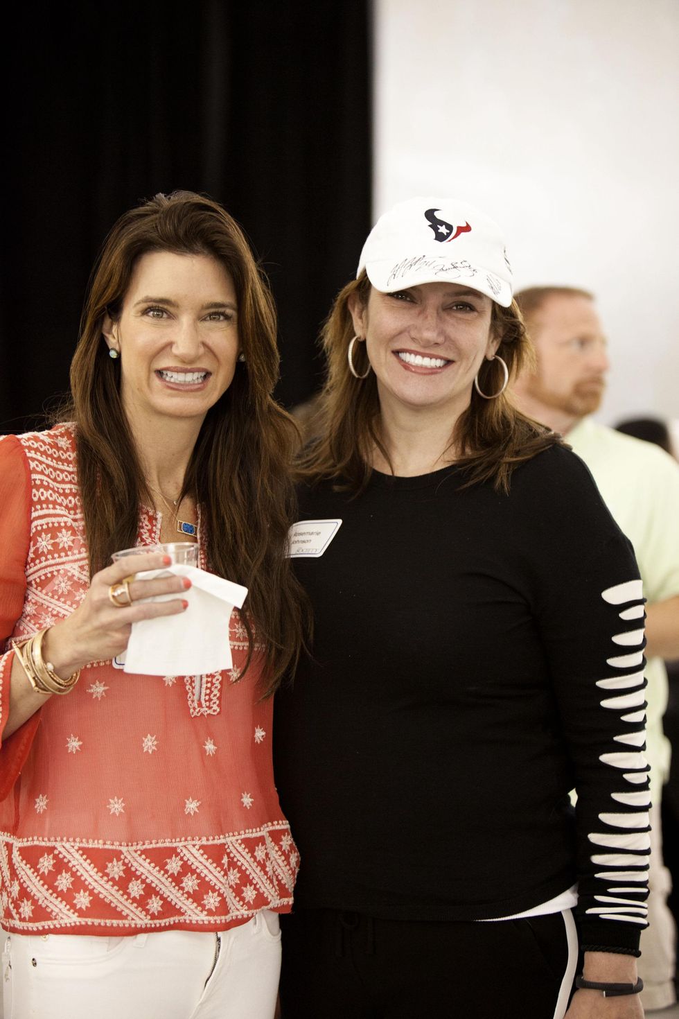 Melissa Mithoff, left, and Rosemarie Johnson at The Society for Leading Medicine Houston Texans Family Field Day May 2014