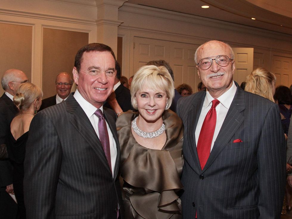 Mike and Karen Mayell, from left, with Shafik Rifaat at the Best Cellars dinner.