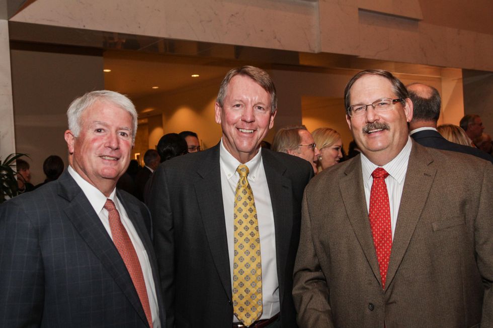Mike Weill, from left, Tom Moyers and Bill McHolick at the Medical Bridges Gala September 2014