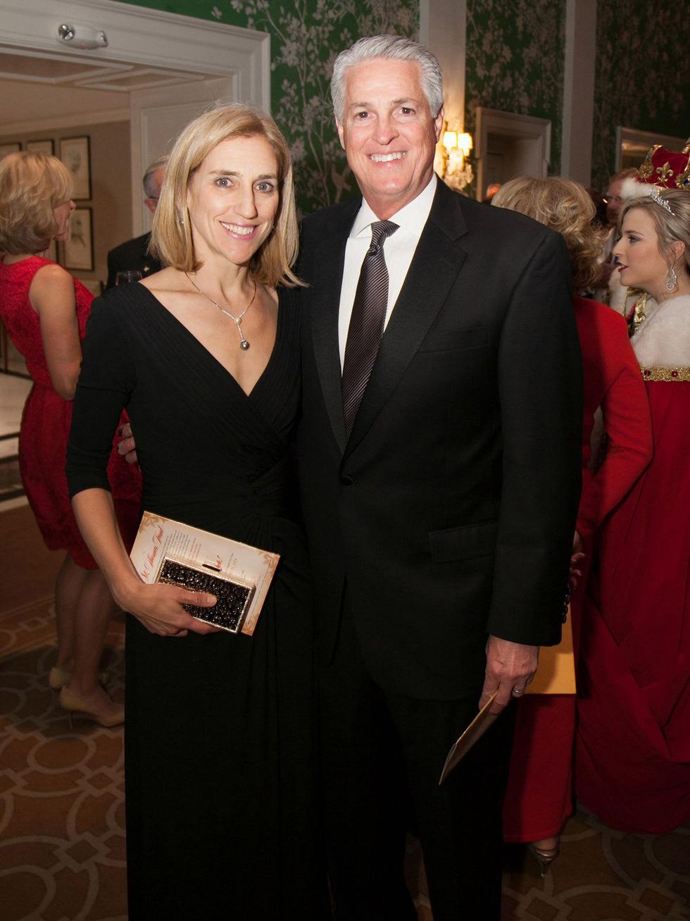 Miki Hebl and David Harvey at the University of St. Thomas Mardi Gras March 2014