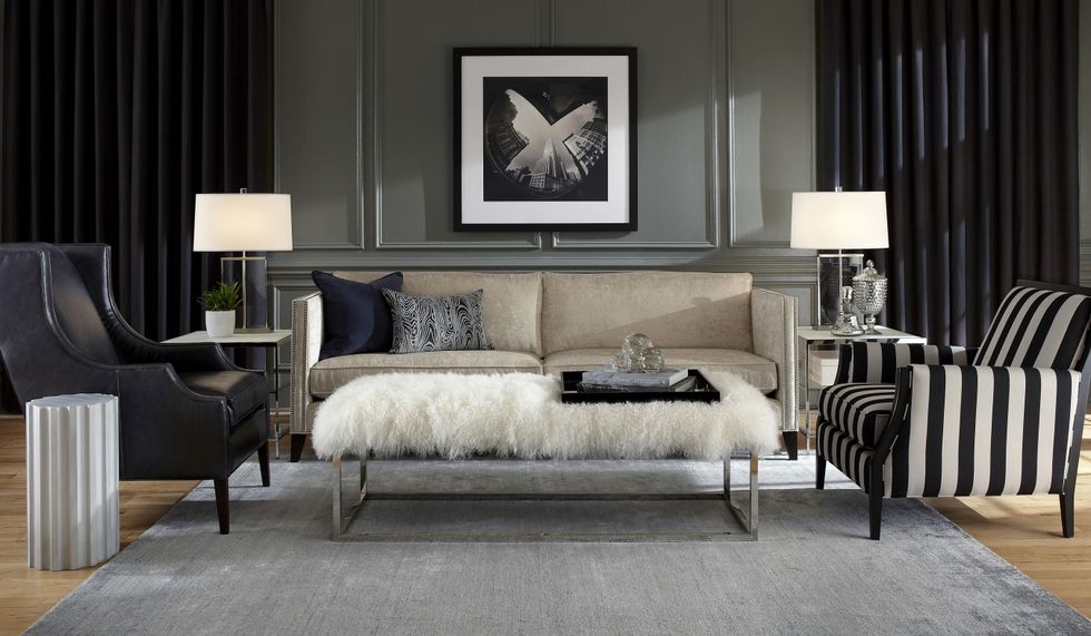 Mitchell Gold + Bob Williams Fall 2013 August 2013 Liam Sofa, Colin Chair (Left) Blakely Chair (Right), Duncan Cocktail Ottoman, Shimmer Rug, New York City Sky \u2013 vintage photography in wood frame