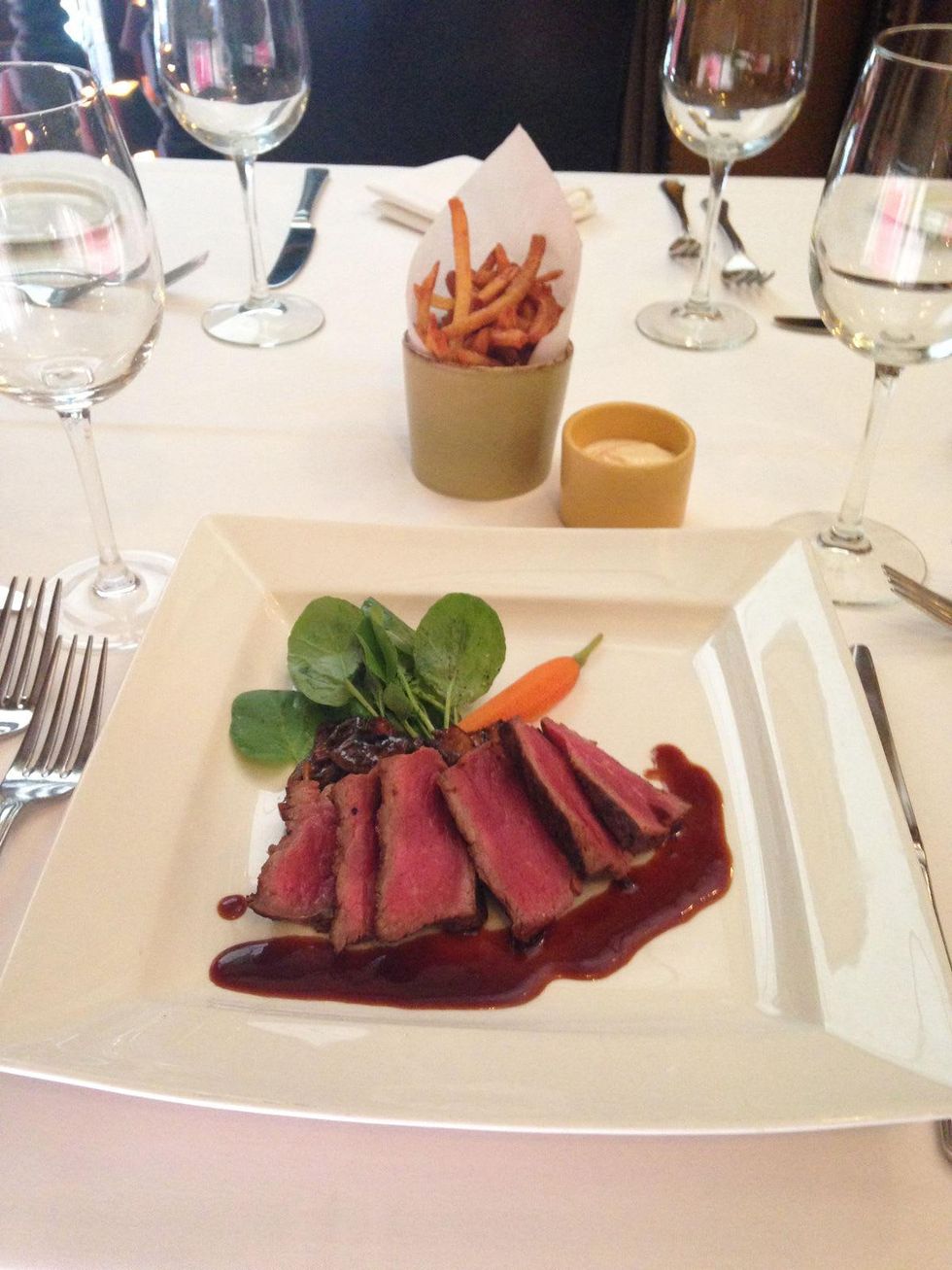 Mocking Bird Bistro petite cab strip steak with wild mushrooms, pommes frites and madeira sauce