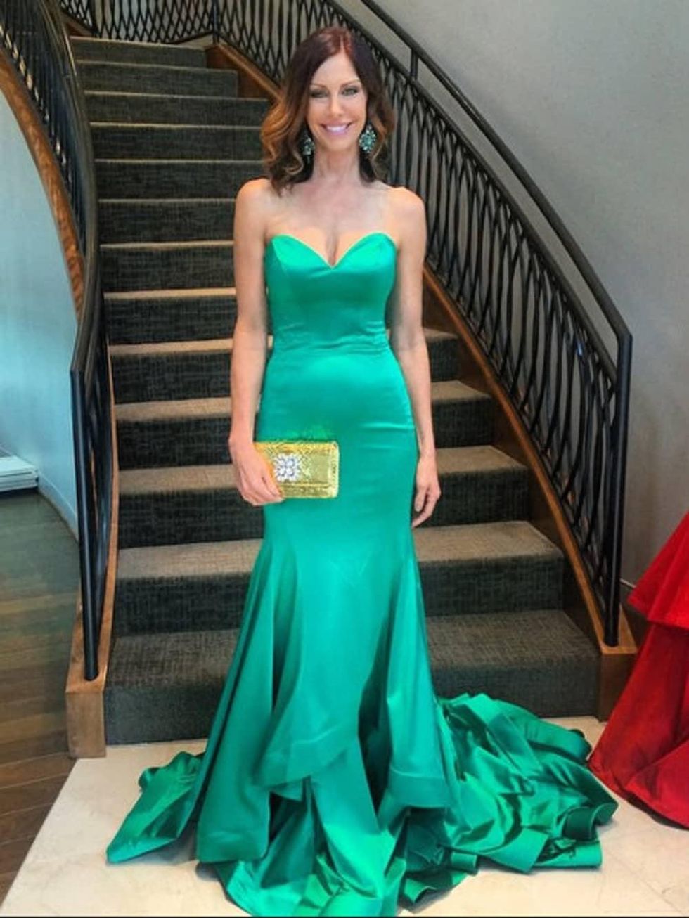 Model in Sherri Hill gown and Carlos Falchi clutch at Elizabeth Anthony